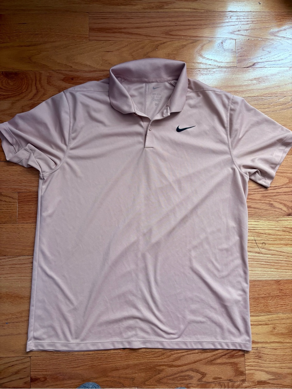 Nike Men’s Light Pink Polo Shirt with Black Swoosh